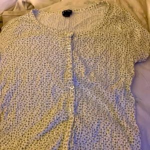 A cute art class shirt with green flowers